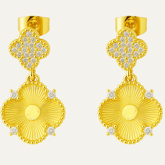Aros Trini en forma de flor enchapados en oro 18k con circones brillantes – Laruz
